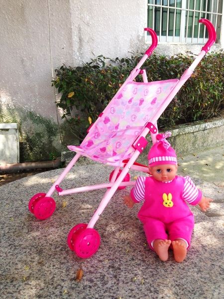 IRON BABY STROLLER W/DOLL - HP1090394