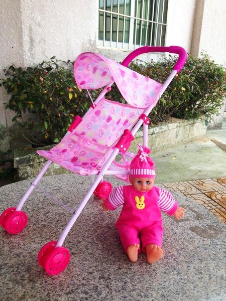 IRON BABY STROLLER W/DOLL - HP1090396